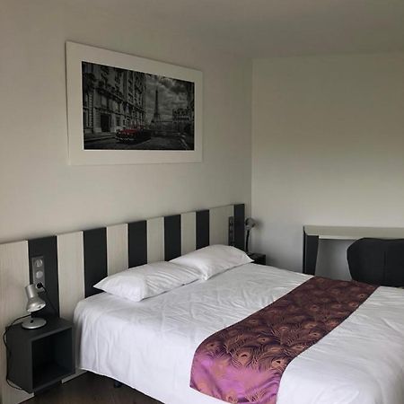 Logis Hotels - Hotel Restaurant L Enclos Donneville Bagian luar foto