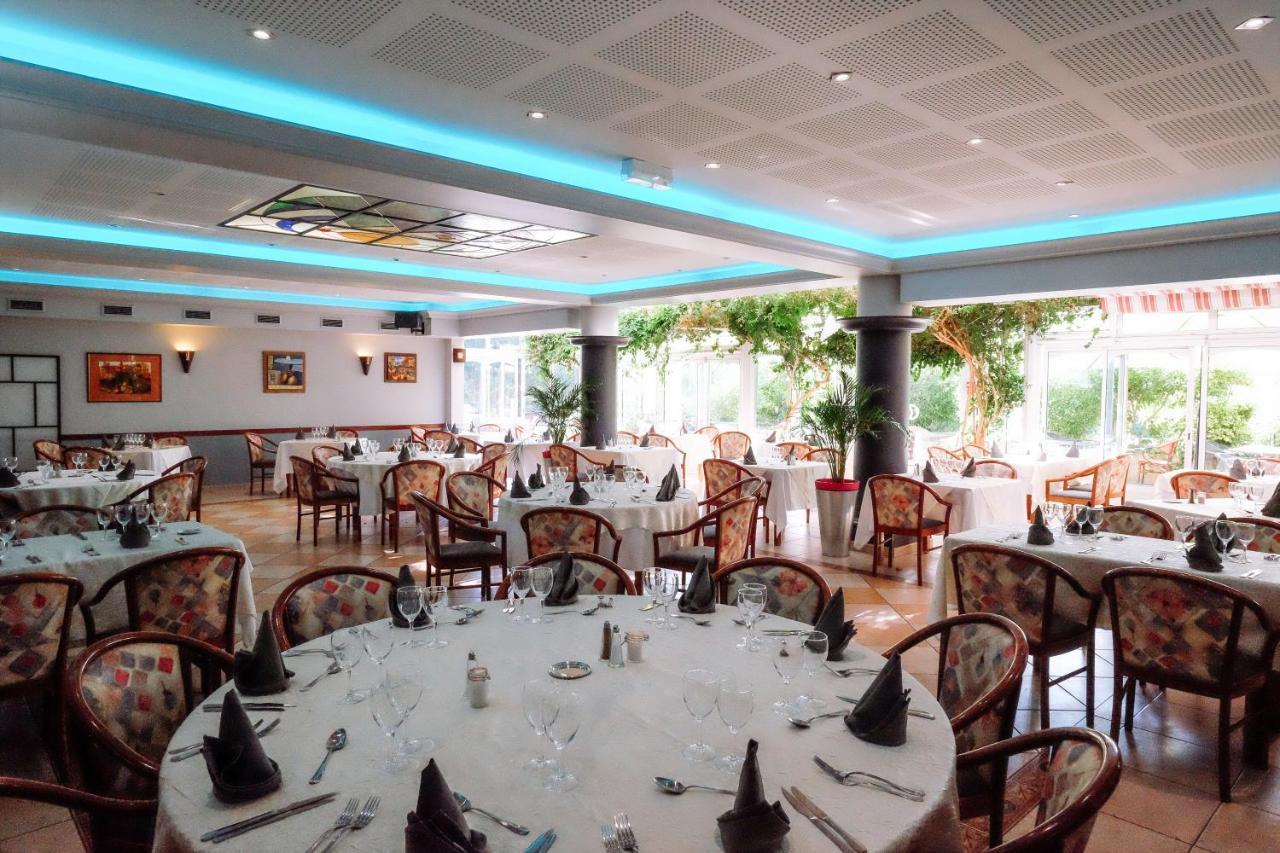 Logis Hotels - Hotel Restaurant L Enclos Donneville Bagian luar foto