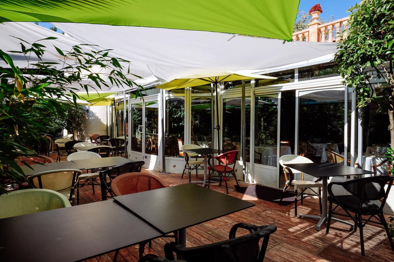 Logis Hotels - Hotel Restaurant L Enclos Donneville Bagian luar foto