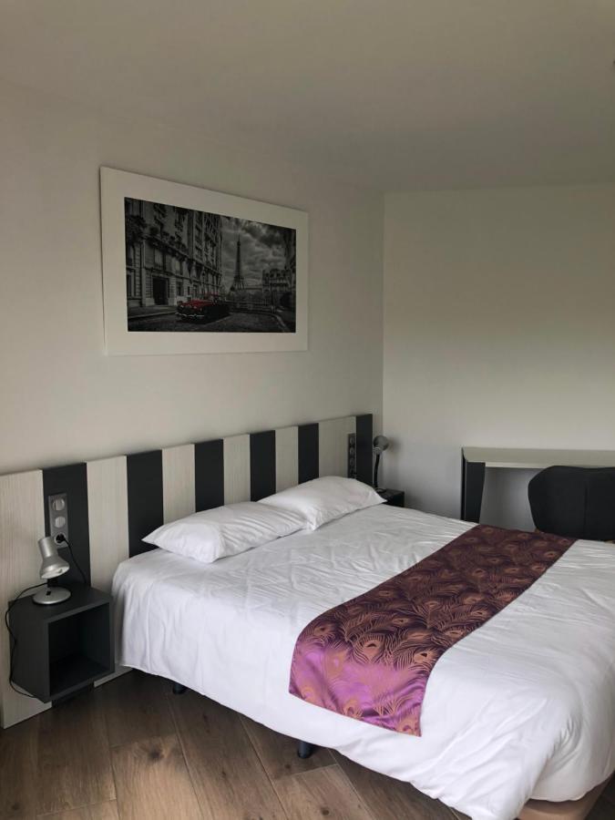 Logis Hotels - Hotel Restaurant L Enclos Donneville Bagian luar foto