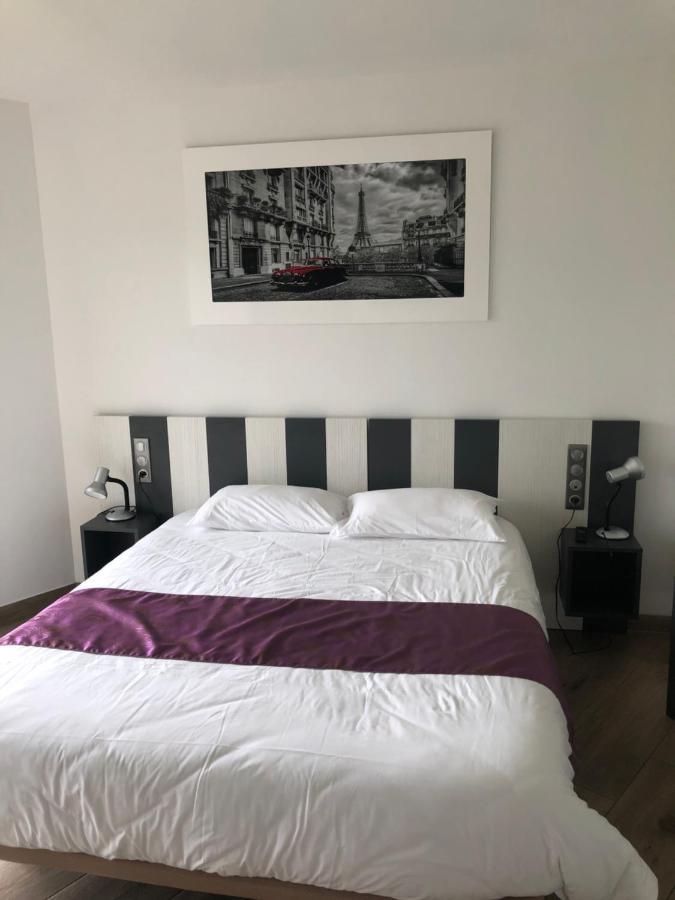 Logis Hotels - Hotel Restaurant L Enclos Donneville Bagian luar foto